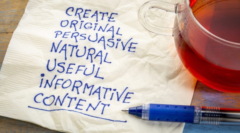 A napkin reading 'create original persuasive natural useful informative content'