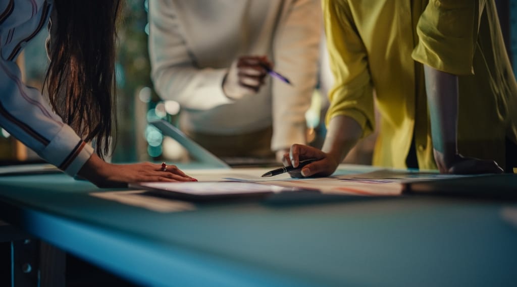 A marketing team meets to break down silos