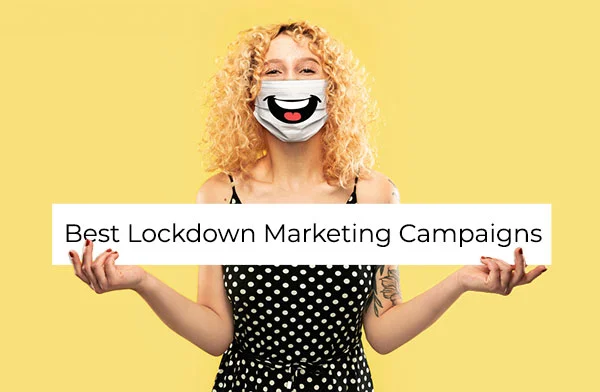 Woman wearing a mask with a laughing mouth printed on it, holding a sign that says 'Best Lockdown Marketing Campaigns'